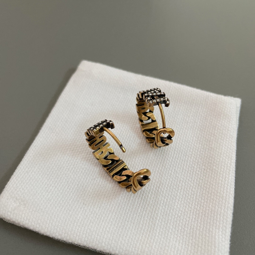 do letter chain ring gold earrings eha384