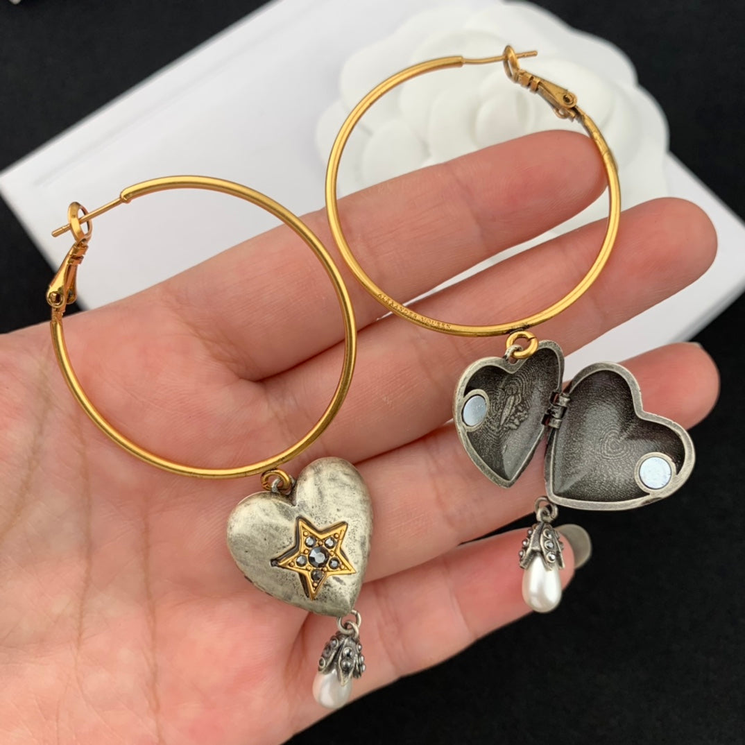 mcqueen heart shaped yellow gold earrings eha670