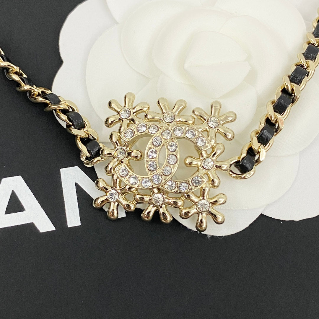 Hollow block flower rhinestone leather necklace XLA287