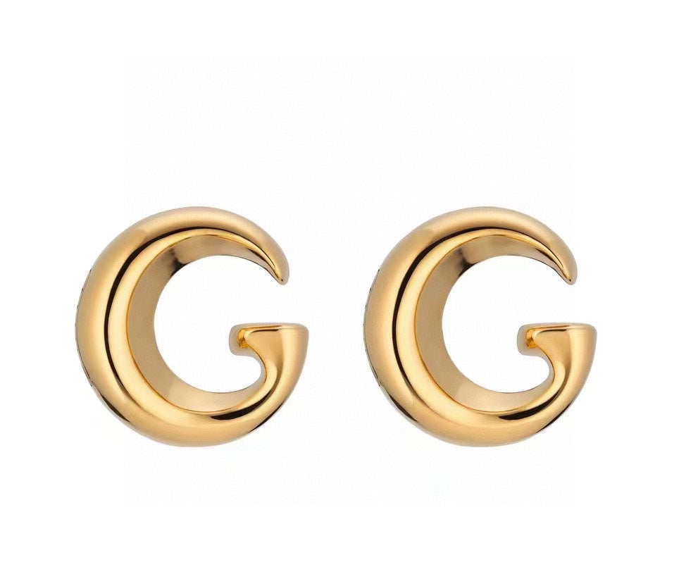 gg personality curved yellow gold earrings eha647