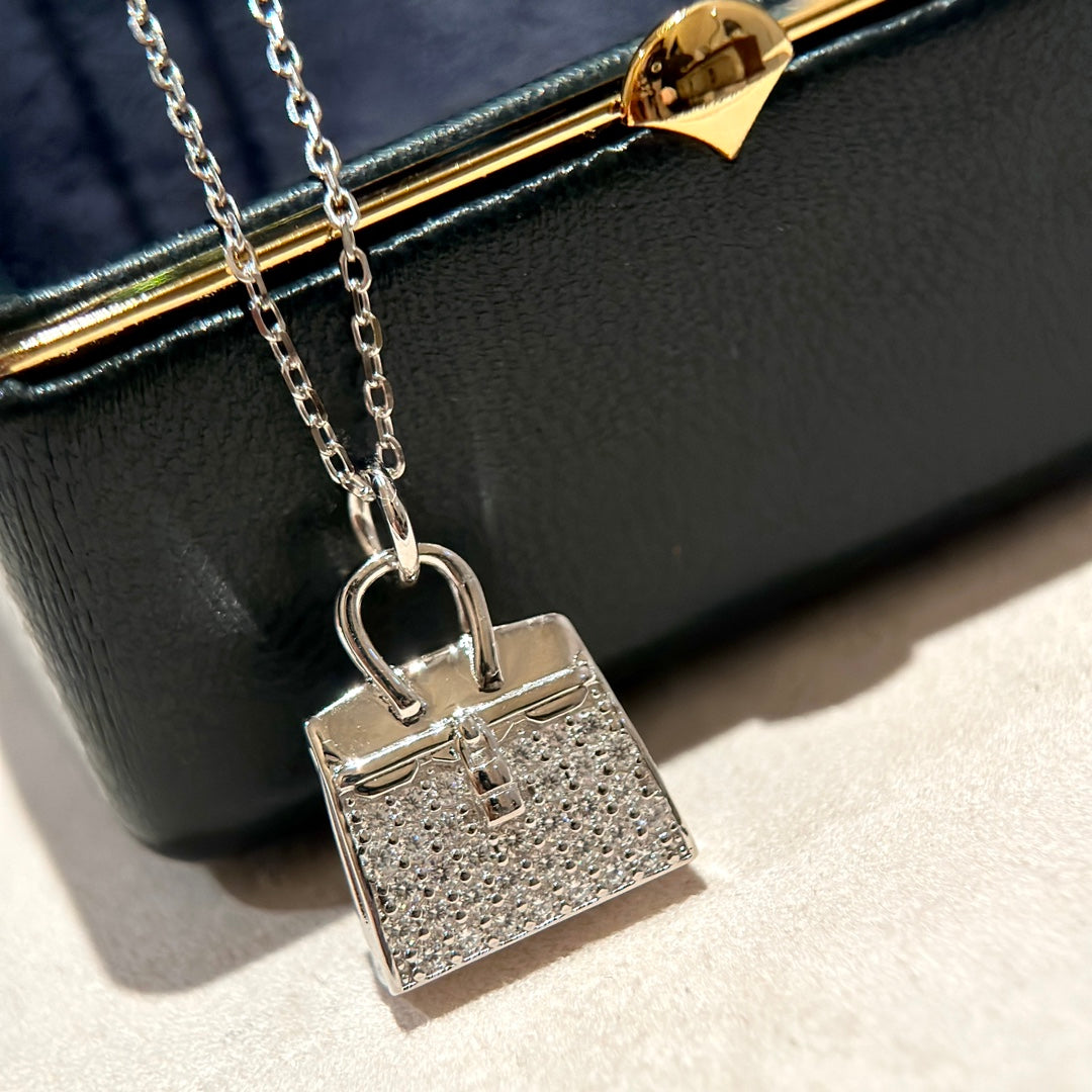 Platinum diamond encrusted handbag necklace XLA341