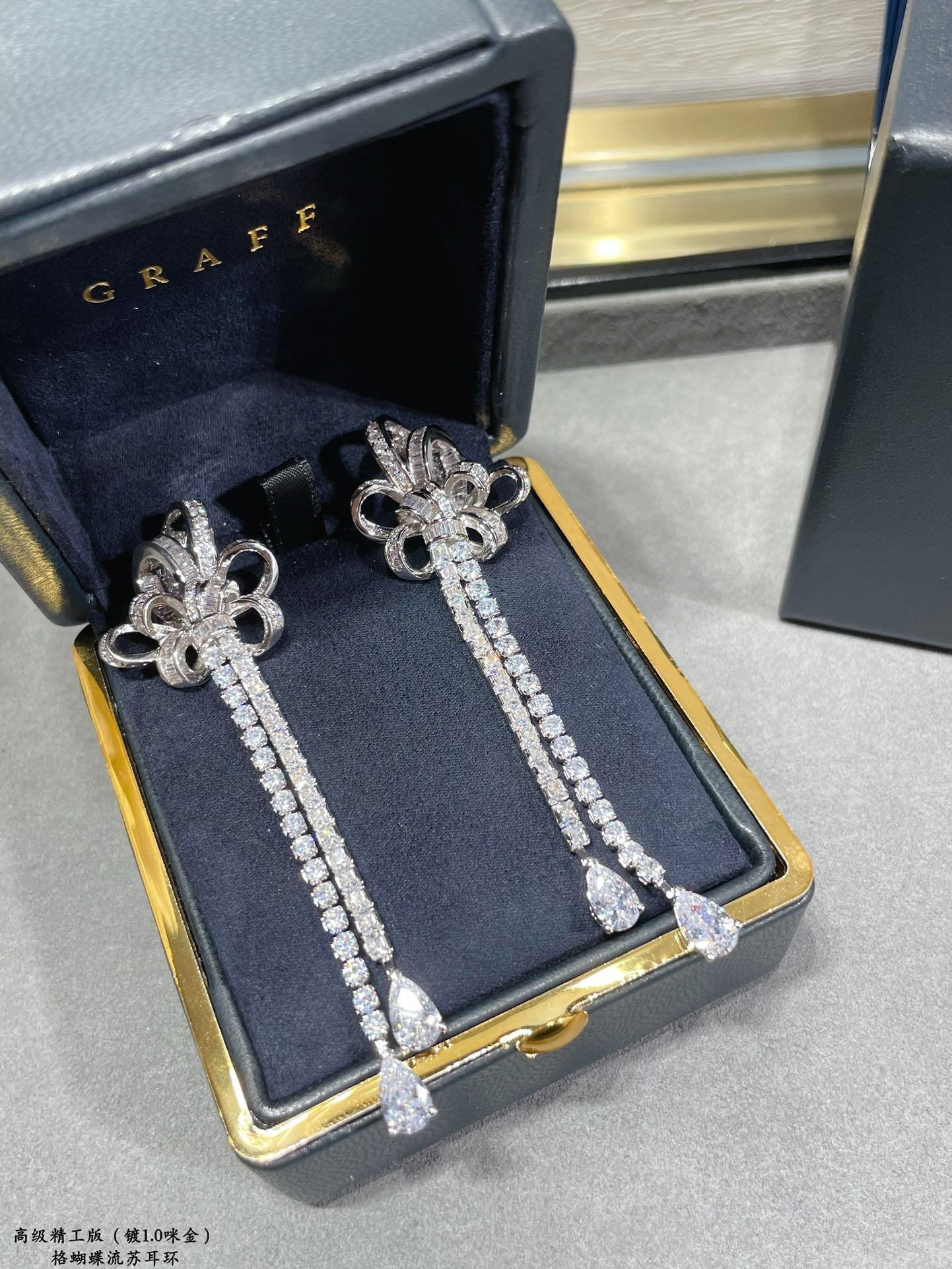 graff butterfly tassel silver earrings eha676