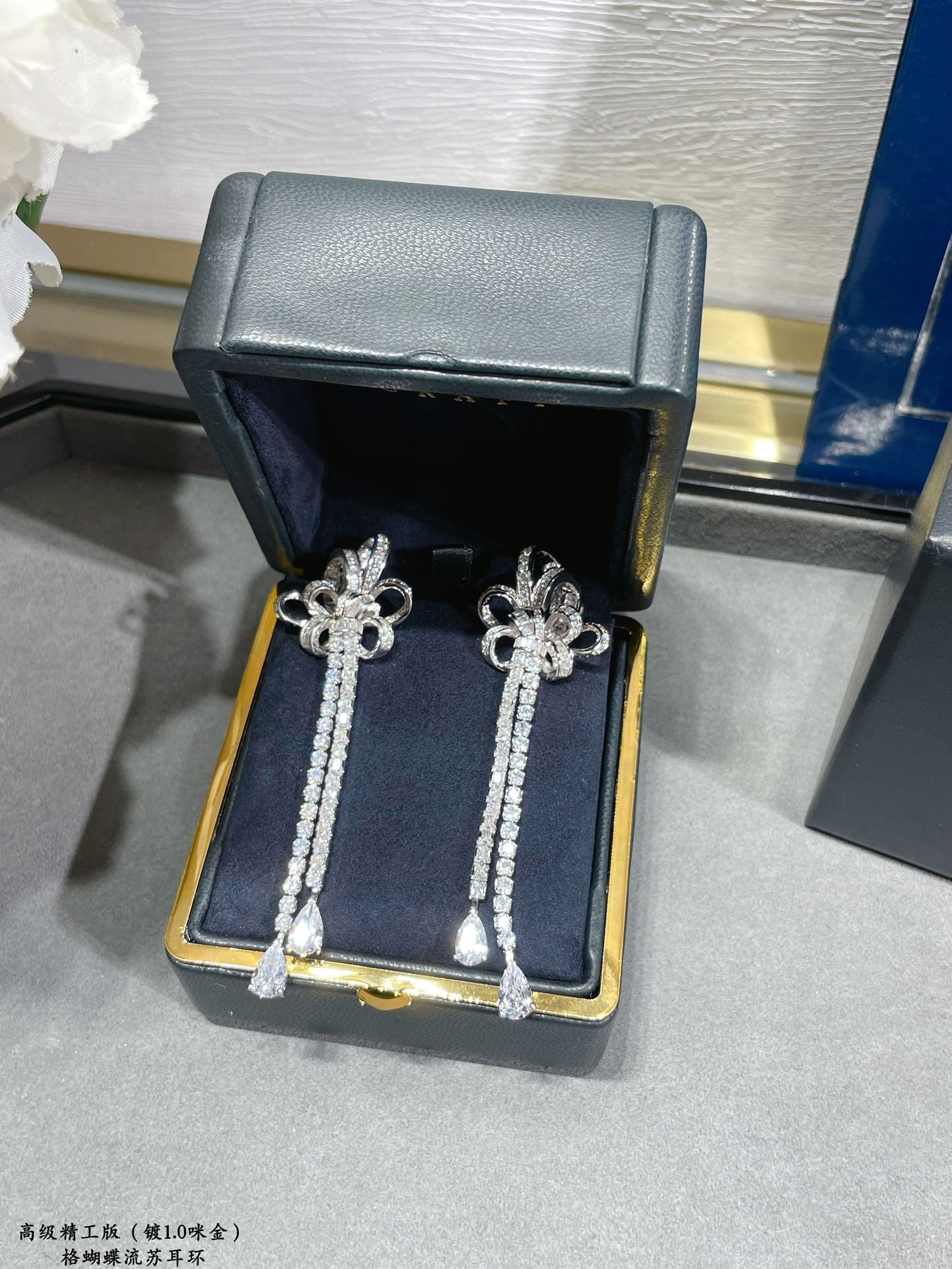 graff butterfly tassel silver earrings eha676