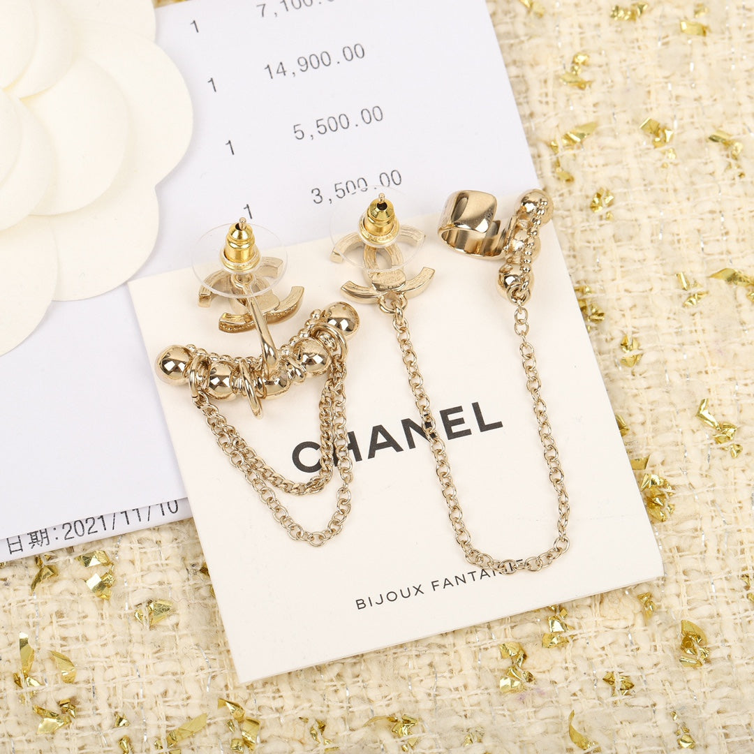 double c studded asymmetric tassel earrings eha558