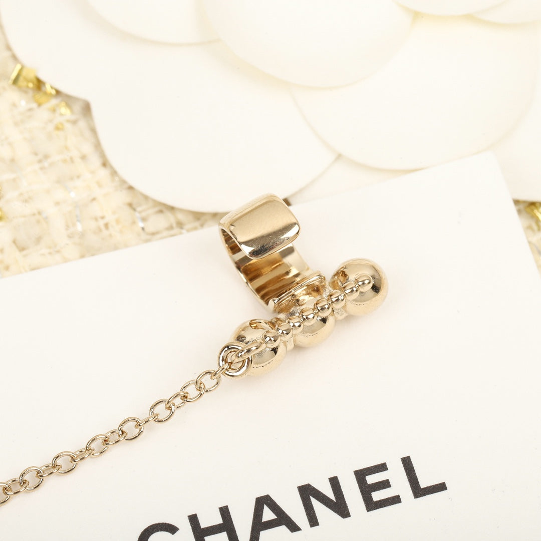 double c studded asymmetric tassel earrings eha558