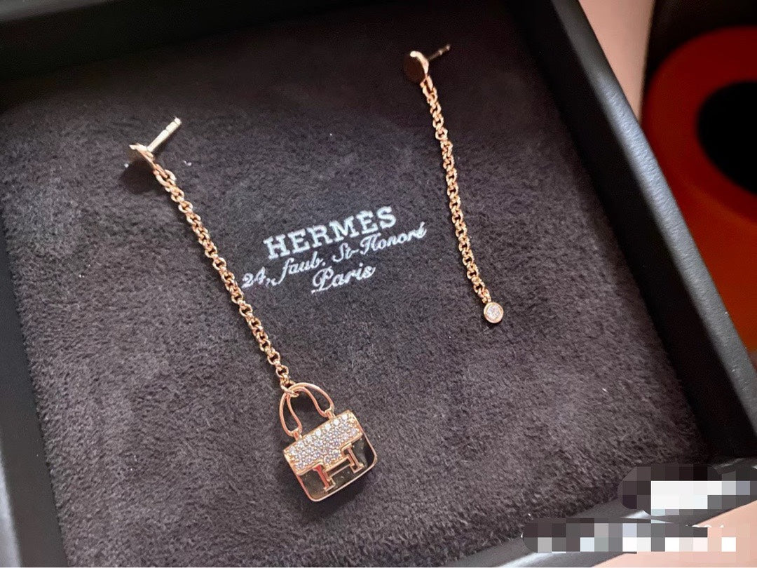 Kangkang Asymmetric rose gold Earrings EHA689