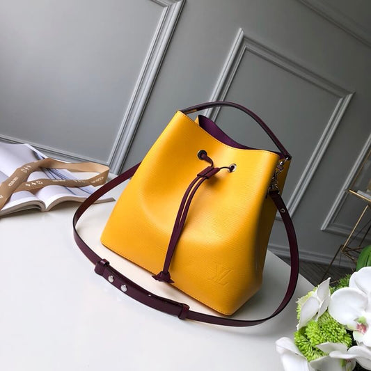 M54369 LOCKME BUCKET messenger bucket bag yellow Lambskin champagne bottle