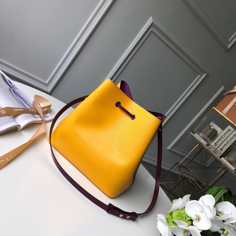 M54369 LOCKME BUCKET messenger bucket bag yellow Lambskin champagne bottle