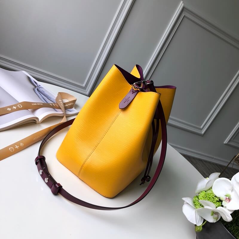 M54369 LOCKME BUCKET messenger bucket bag yellow Lambskin champagne bottle