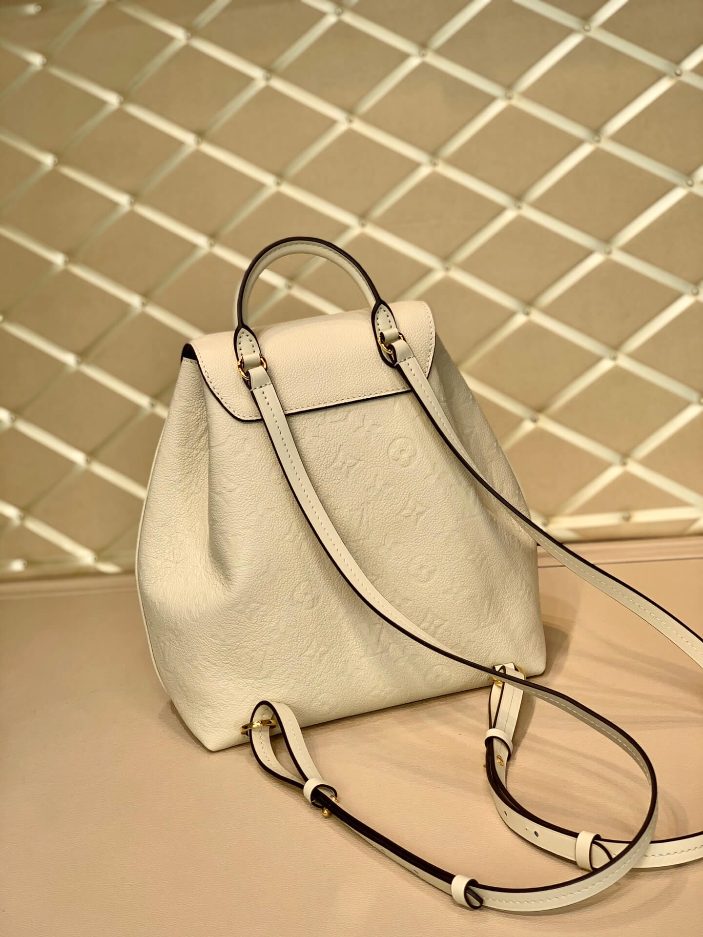 M45397 Montsouris Monogram Empreinte backpack milk white calfskin