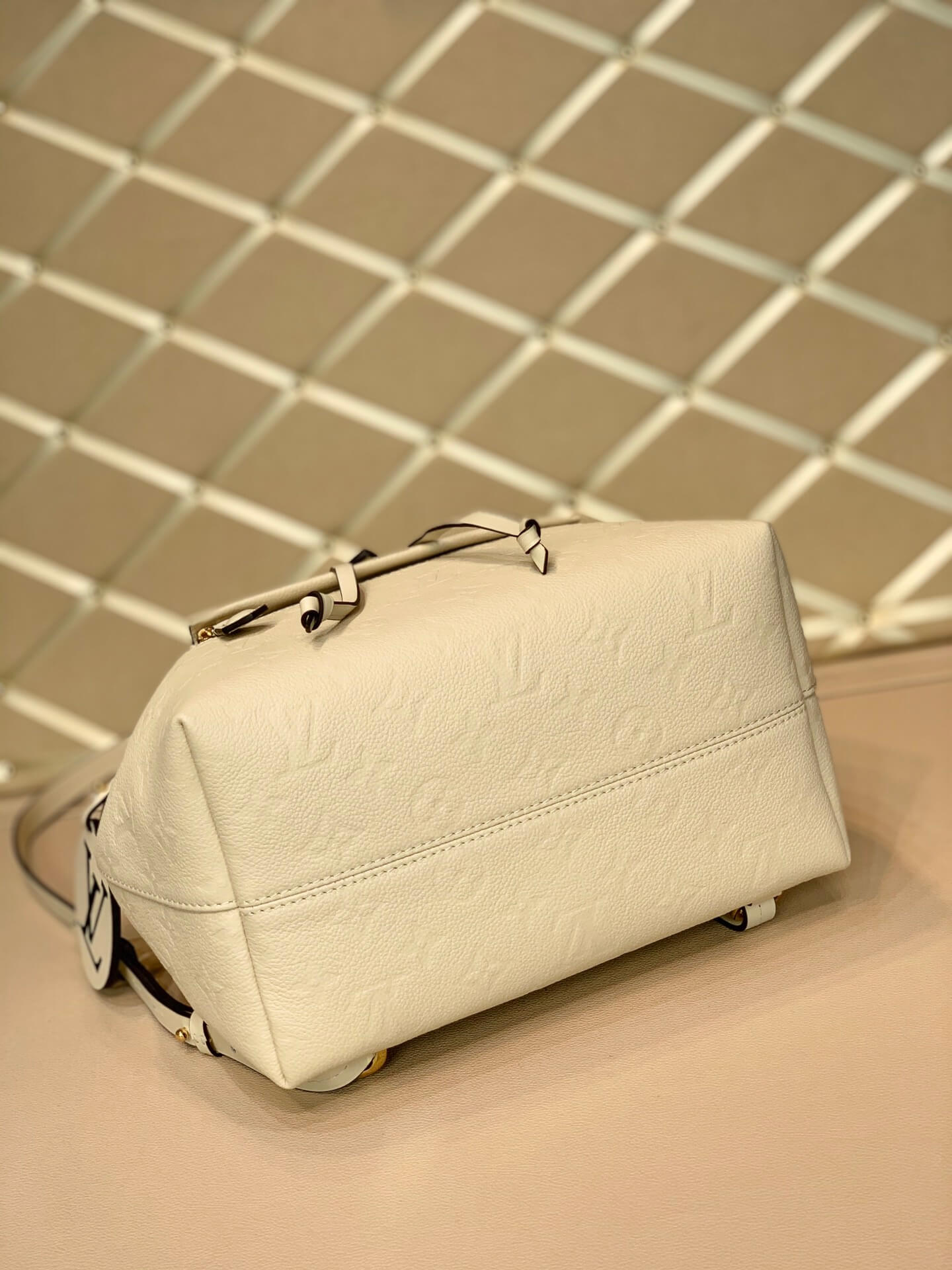 M45397 Montsouris Monogram Empreinte backpack milk white calfskin