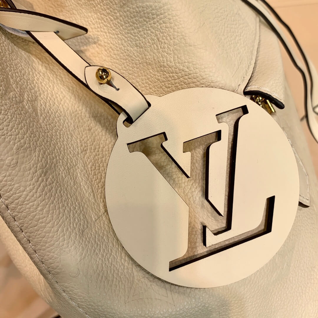 M45397 Montsouris Monogram Empreinte backpack milk white calfskin