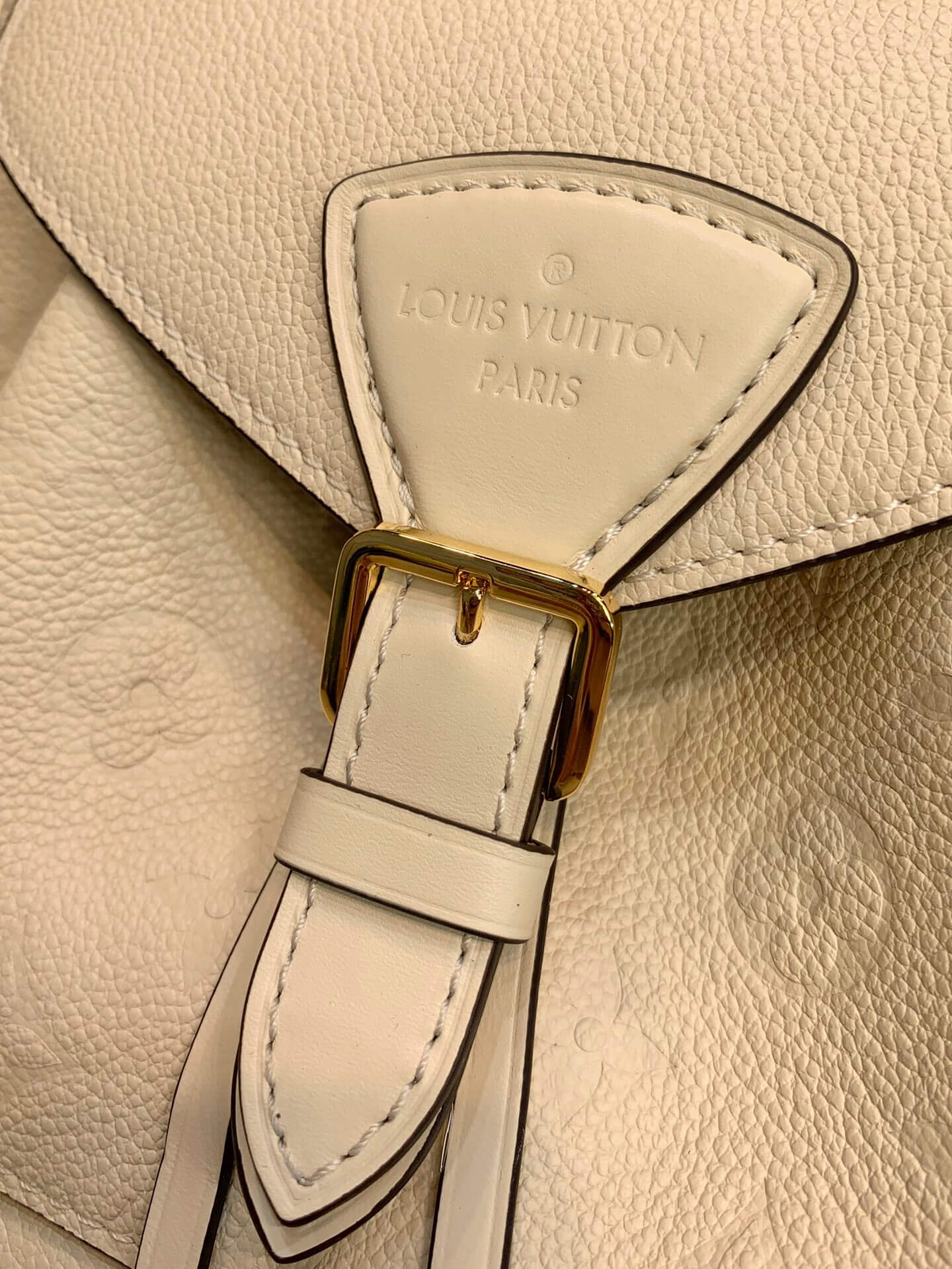 M45397 Montsouris Monogram Empreinte backpack milk white calfskin