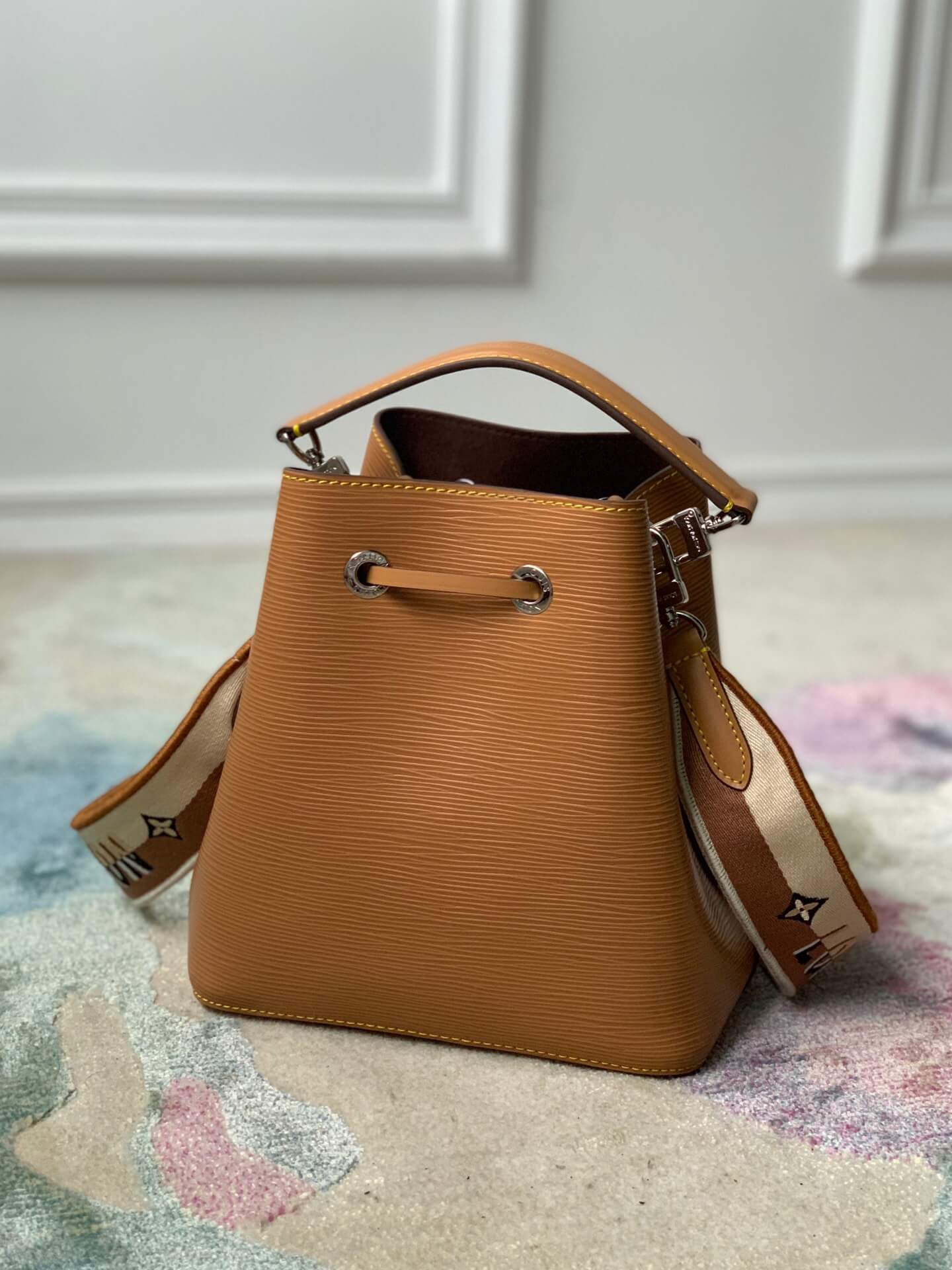 brown bucket bag grained epi leather