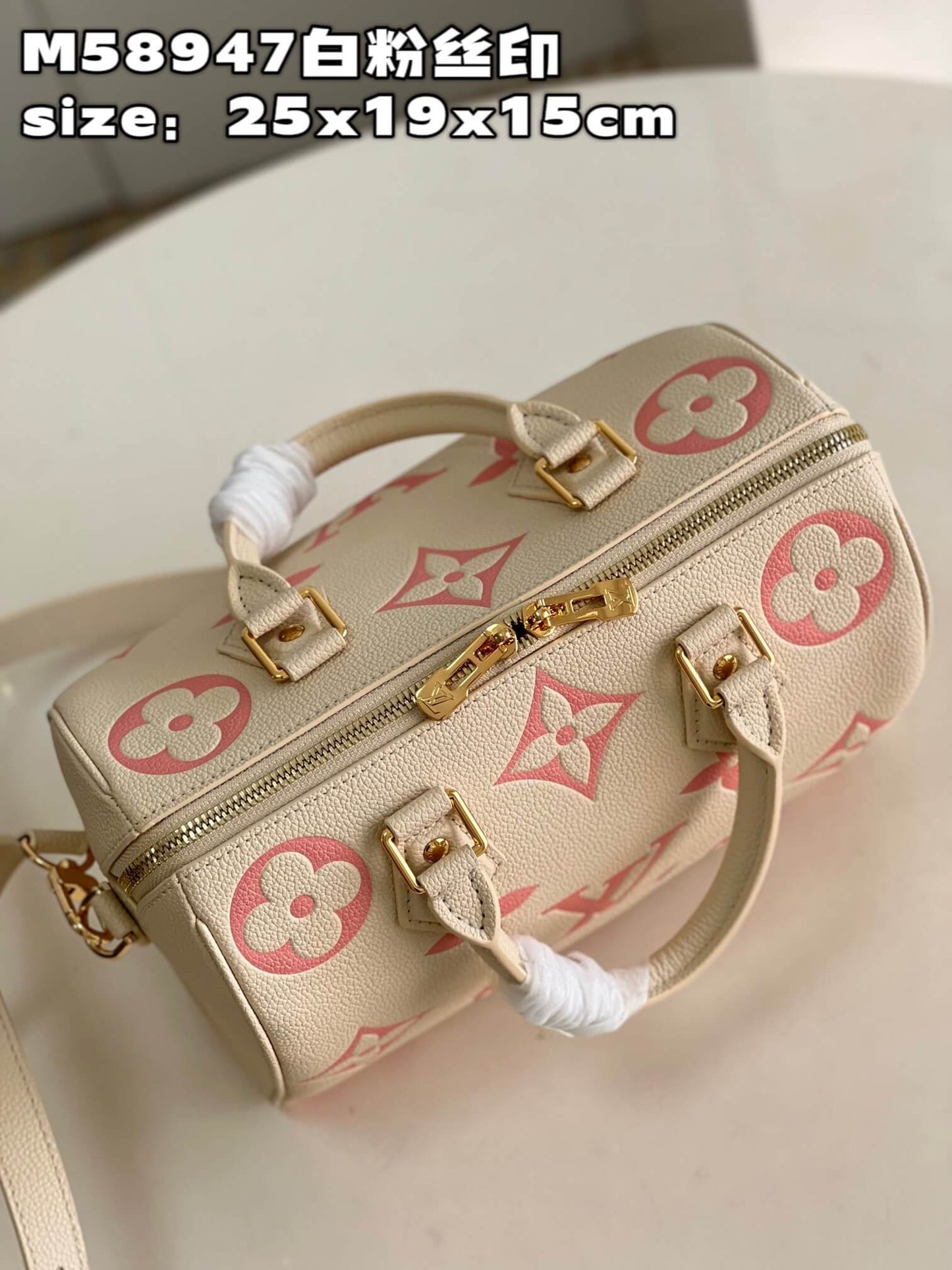 M58947 Speedy Bandoulière 25 Monogram Empreinte White pink print